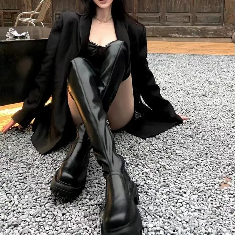 black flat knee high boots