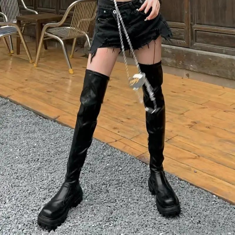 black flat knee high boots