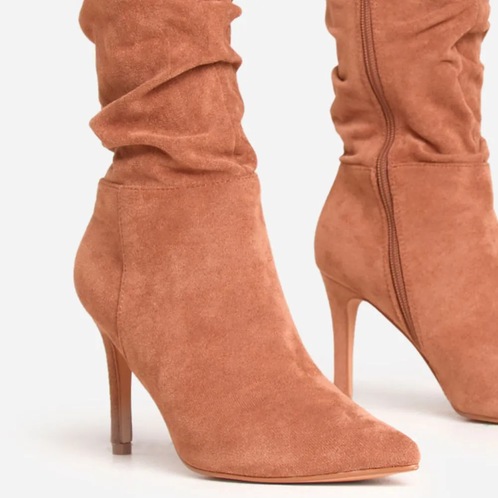 Styling Your Tan Boots Knee High for Versatility